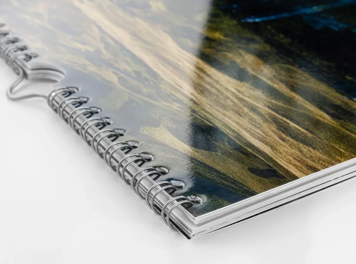 Wall calendar with digital printing paper with a high gloss finish and ring holder